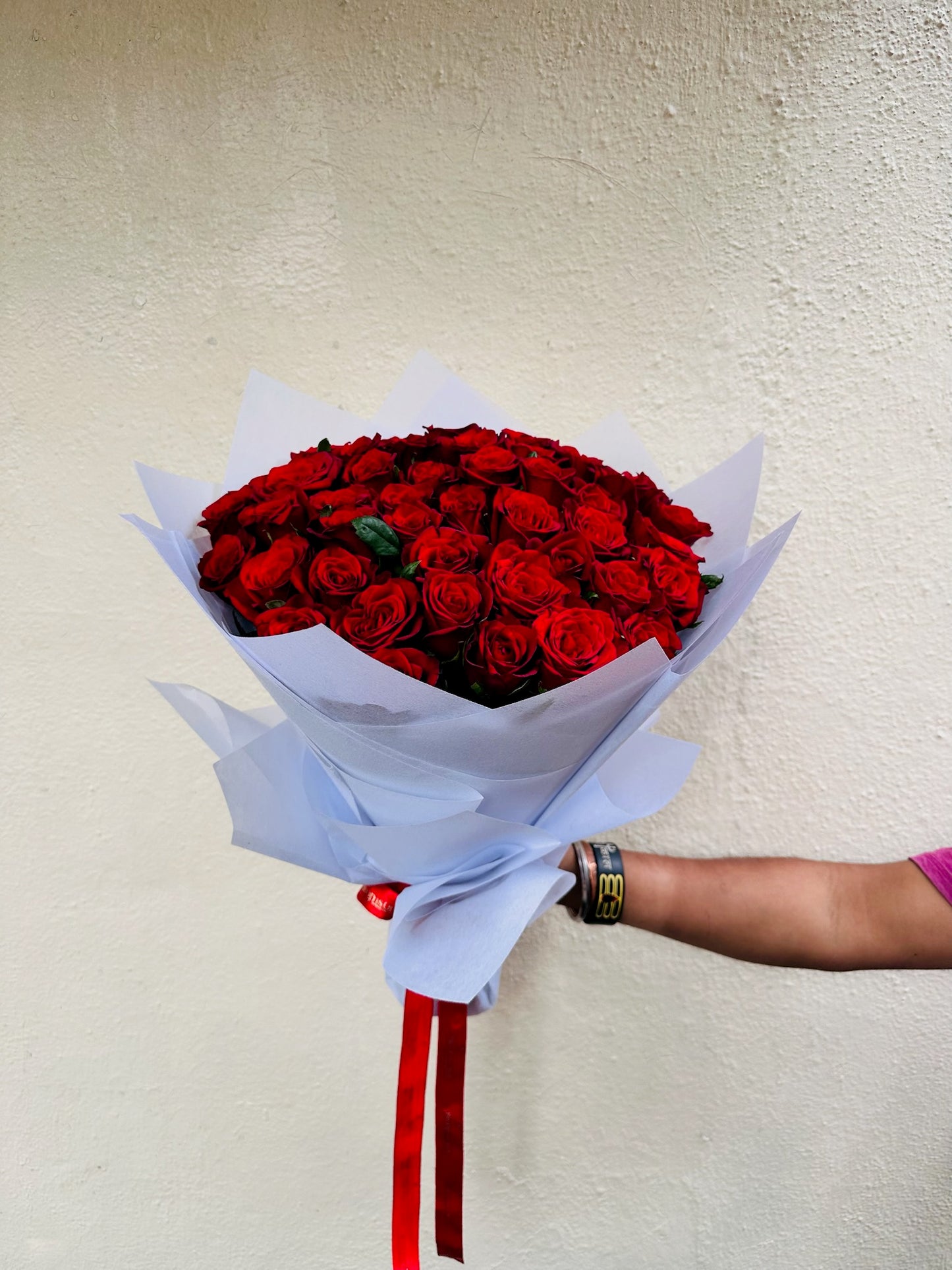 60 red roses hand bouquet