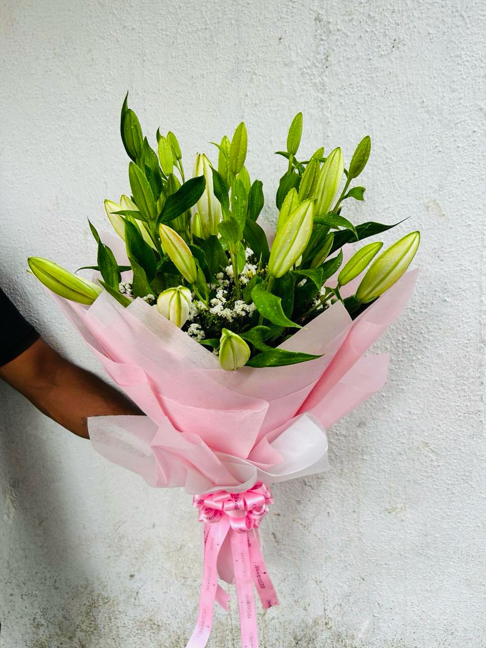 Pink Orintal Lily hand bouquet by BloomsOnly, Pune's number 1 flower delivery website