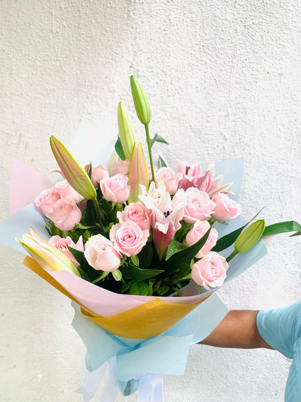 Lily and Roses hand bouquet by BloomsOnly, Pune's number 1 flower delivery website