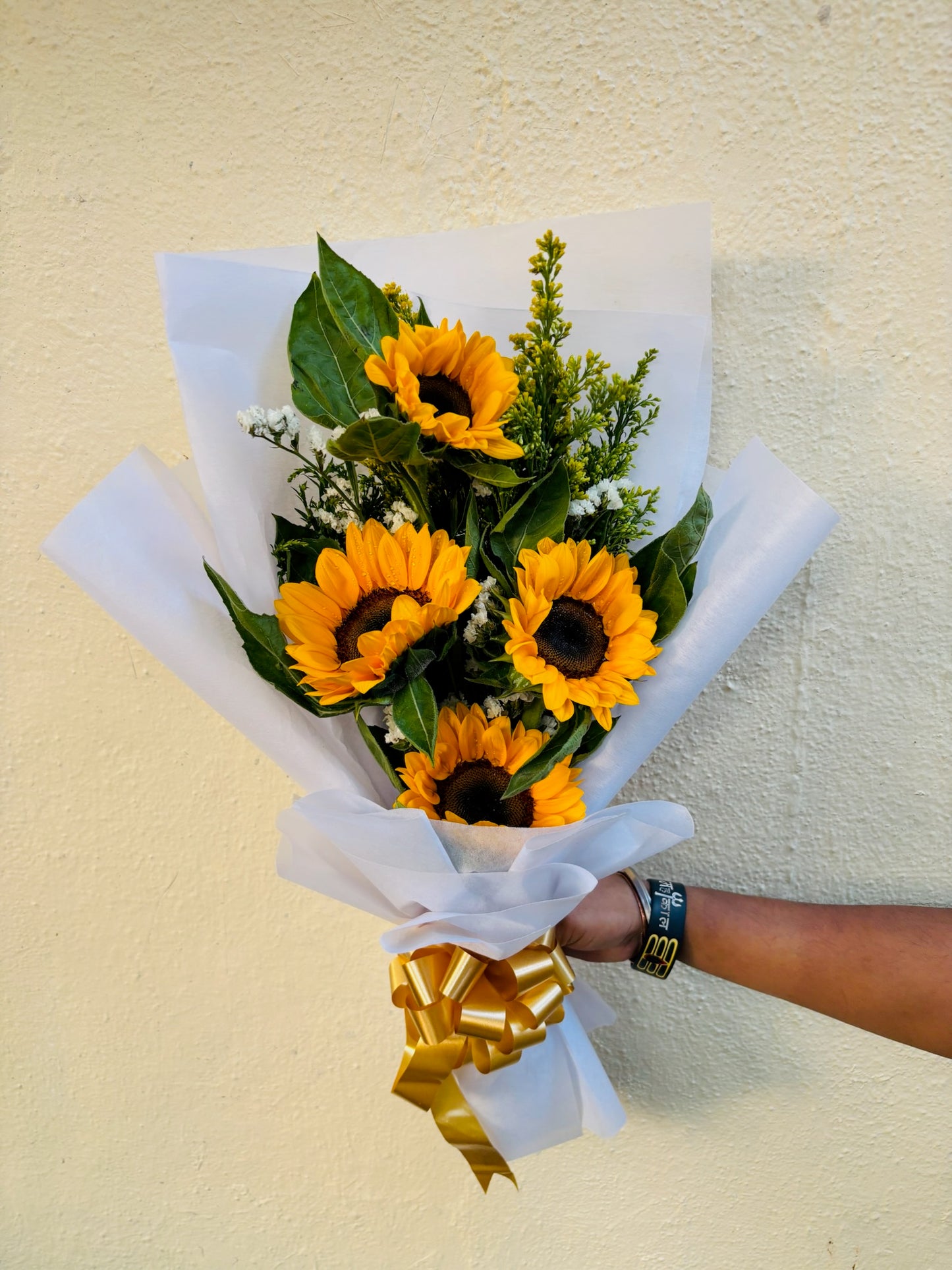 Sunflower Hand Bouquet by BloomsOnly, Pune's number 1 flower delivery website