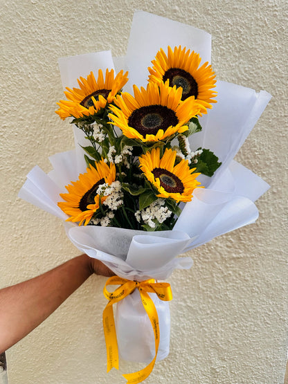Sunflower hand bouquet by BloomOnly who is a premium number 1 florist in pune that delivers same day