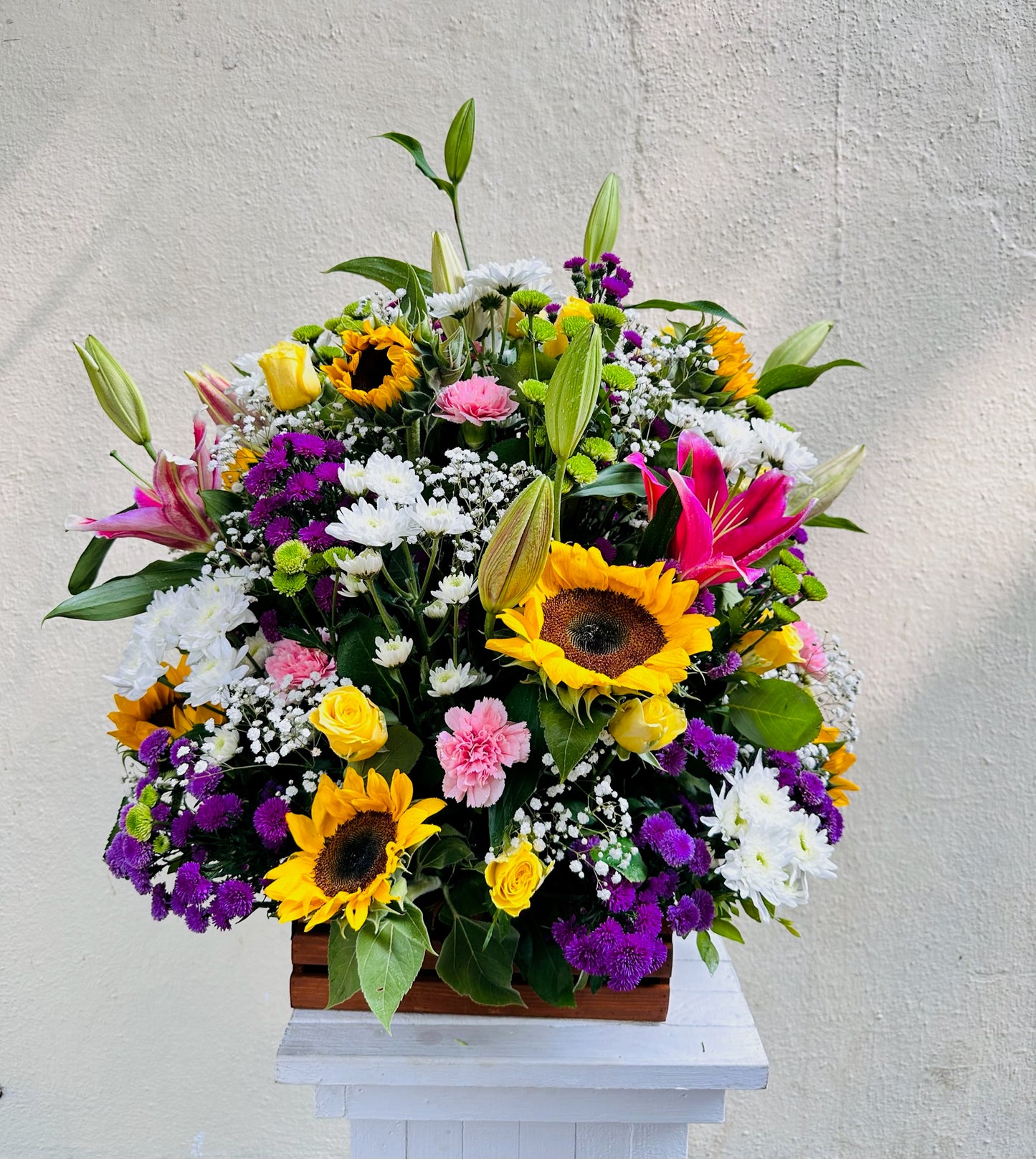 Wooden basket mix flowers